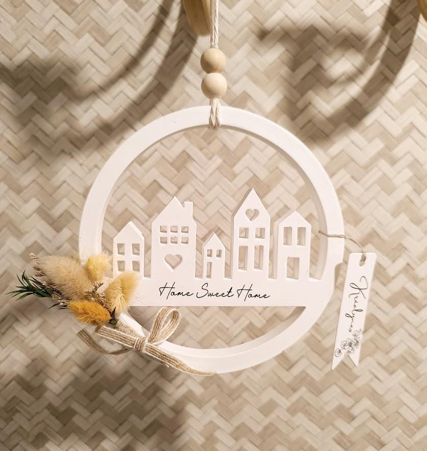 Décoration murale maisonnettes et fleurs séchées