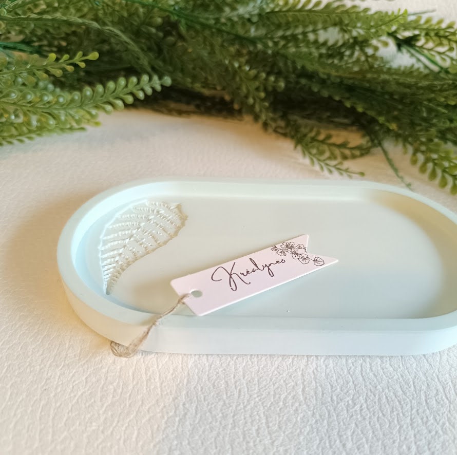 Plateau de rangement turquoise clair motif feuille.