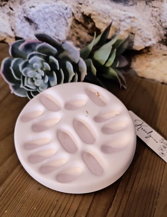 Support de bagues rose pâle