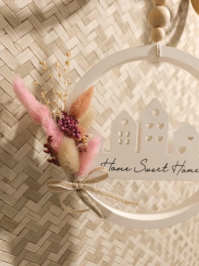 Décoration murale maisonnettes et fleurs séchées