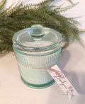 Bougie parfumée "Monoï" contenant en verre turquoise