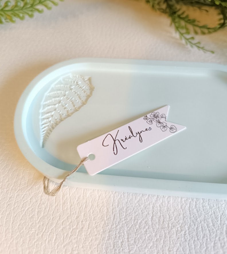 Plateau de rangement turquoise clair motif feuille.